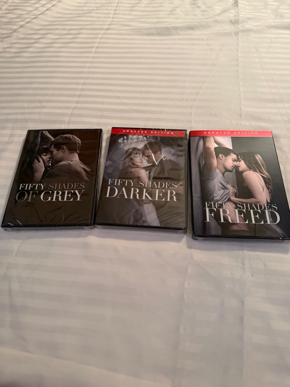 Universal Fifty Shades Trilogy DVDs - Black, Red, Gray
